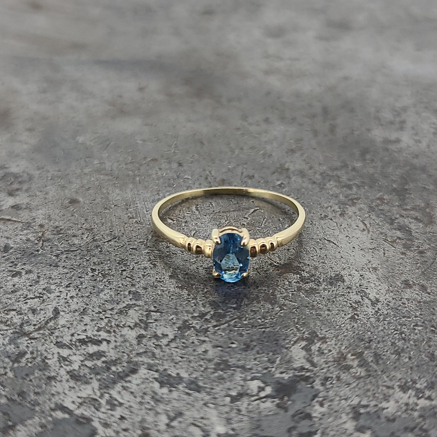 Oval Blue Topaz Ring