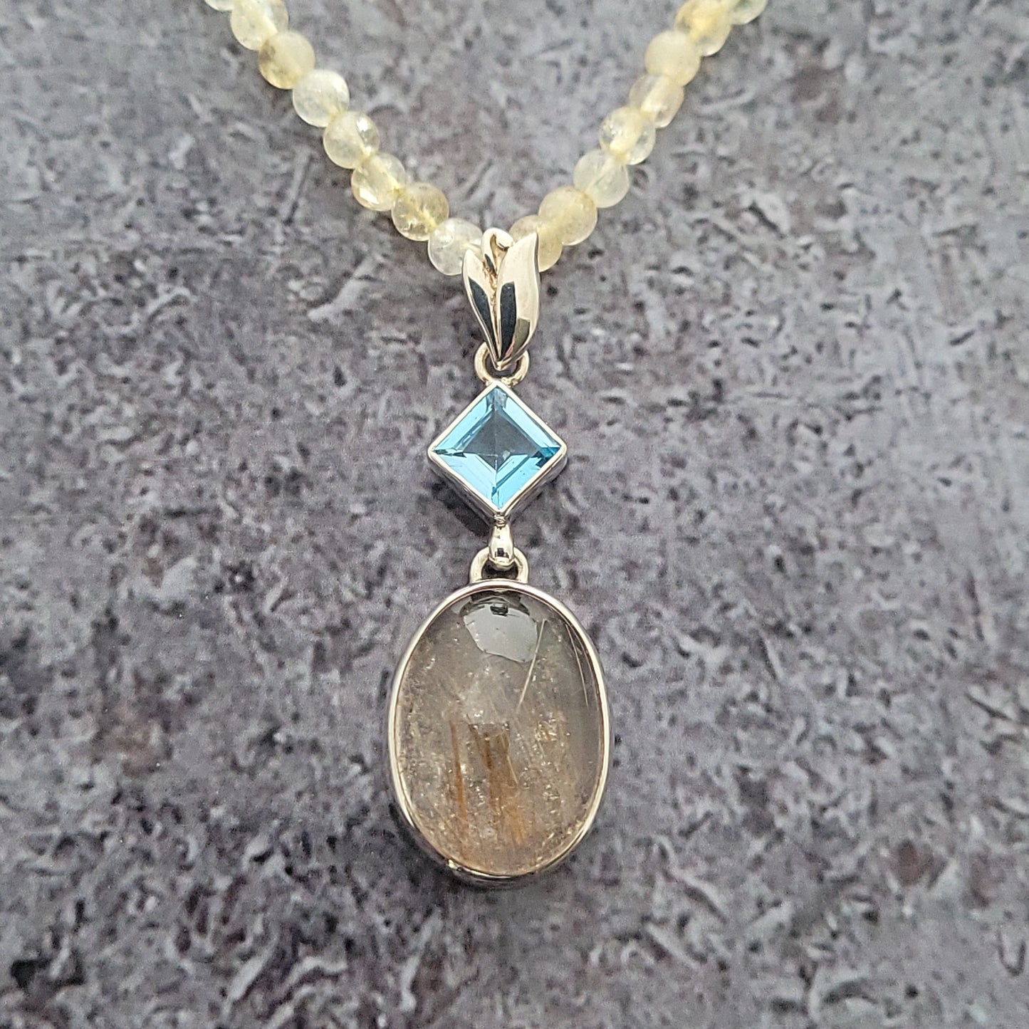Rutilated Quartz and Blue Topaz Pendant