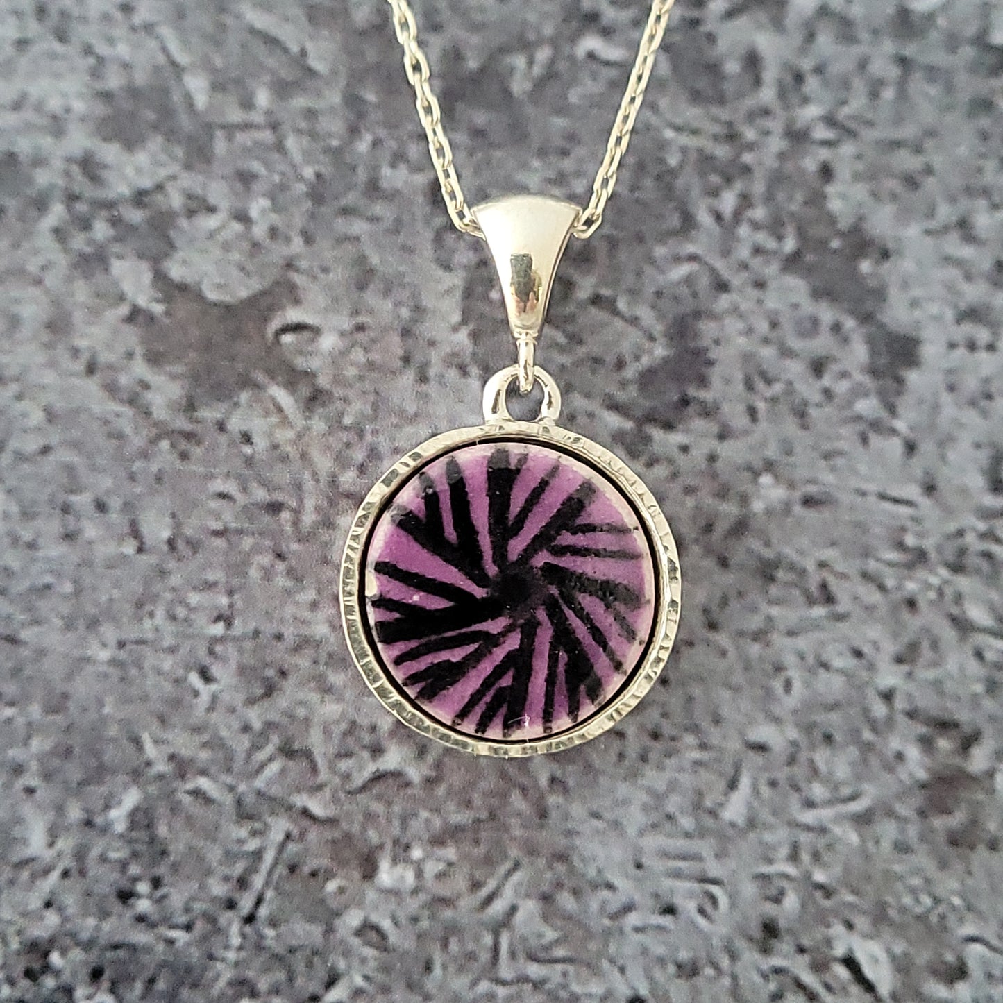 Silver and Ceramic Millstone