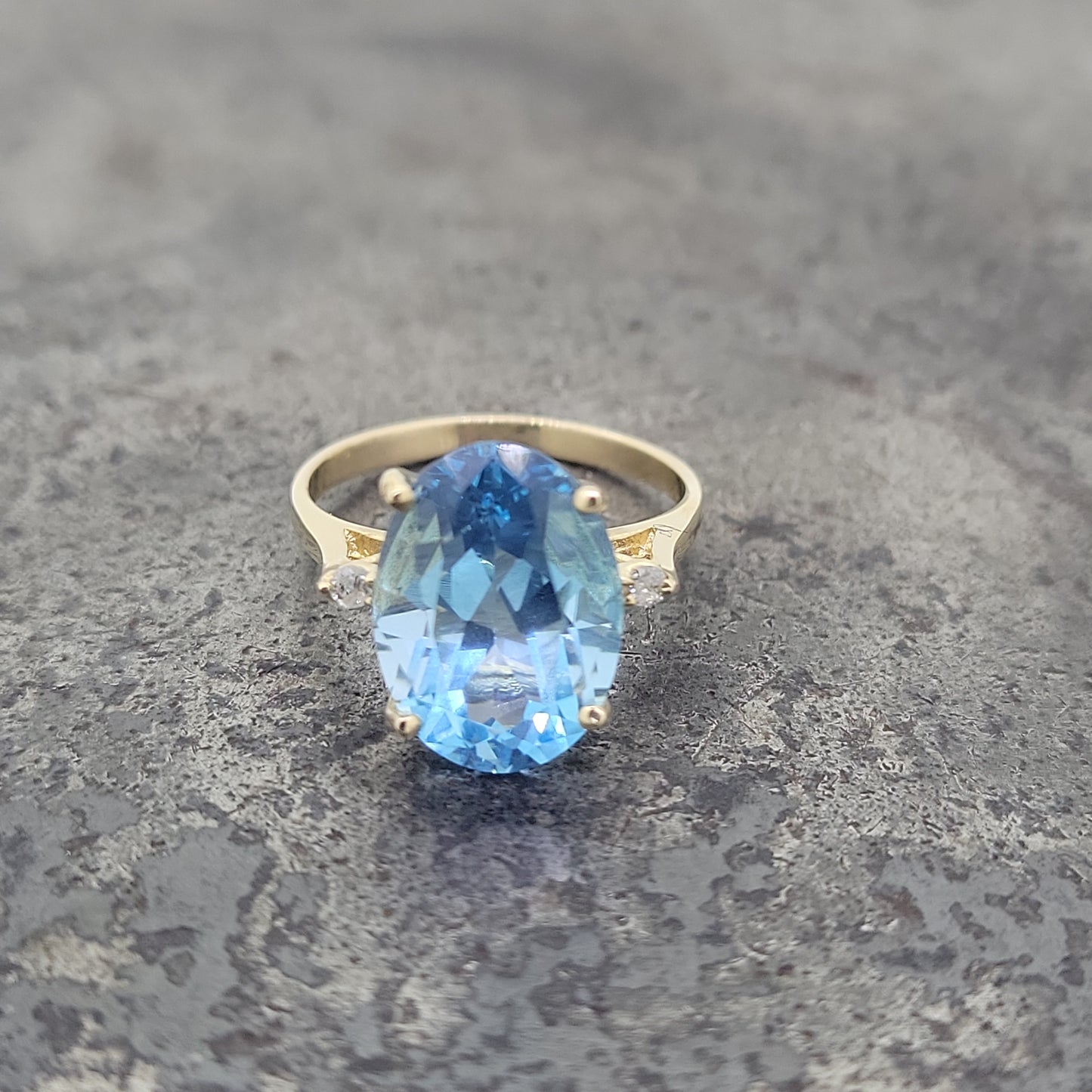 Blue Topaz and Diamond Ring