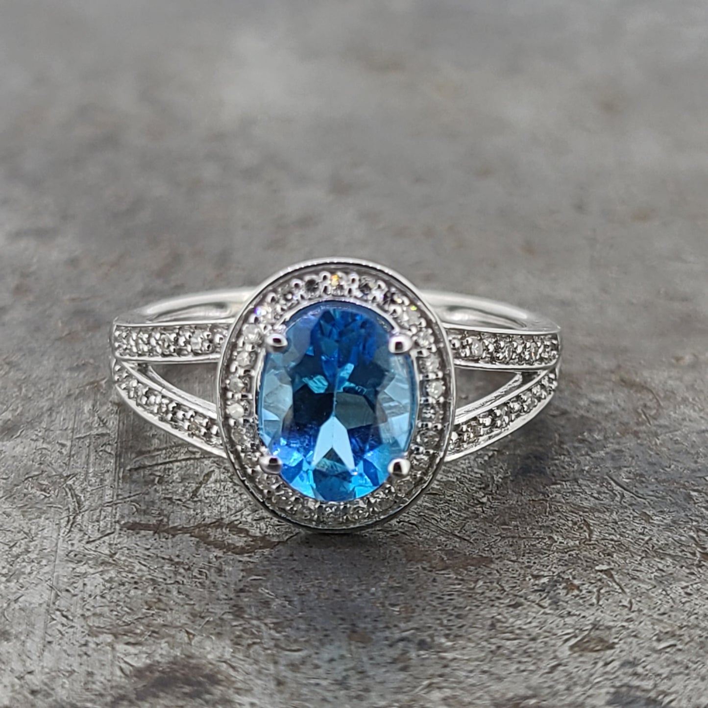 Oval Blue Topaz & Diamond Ring