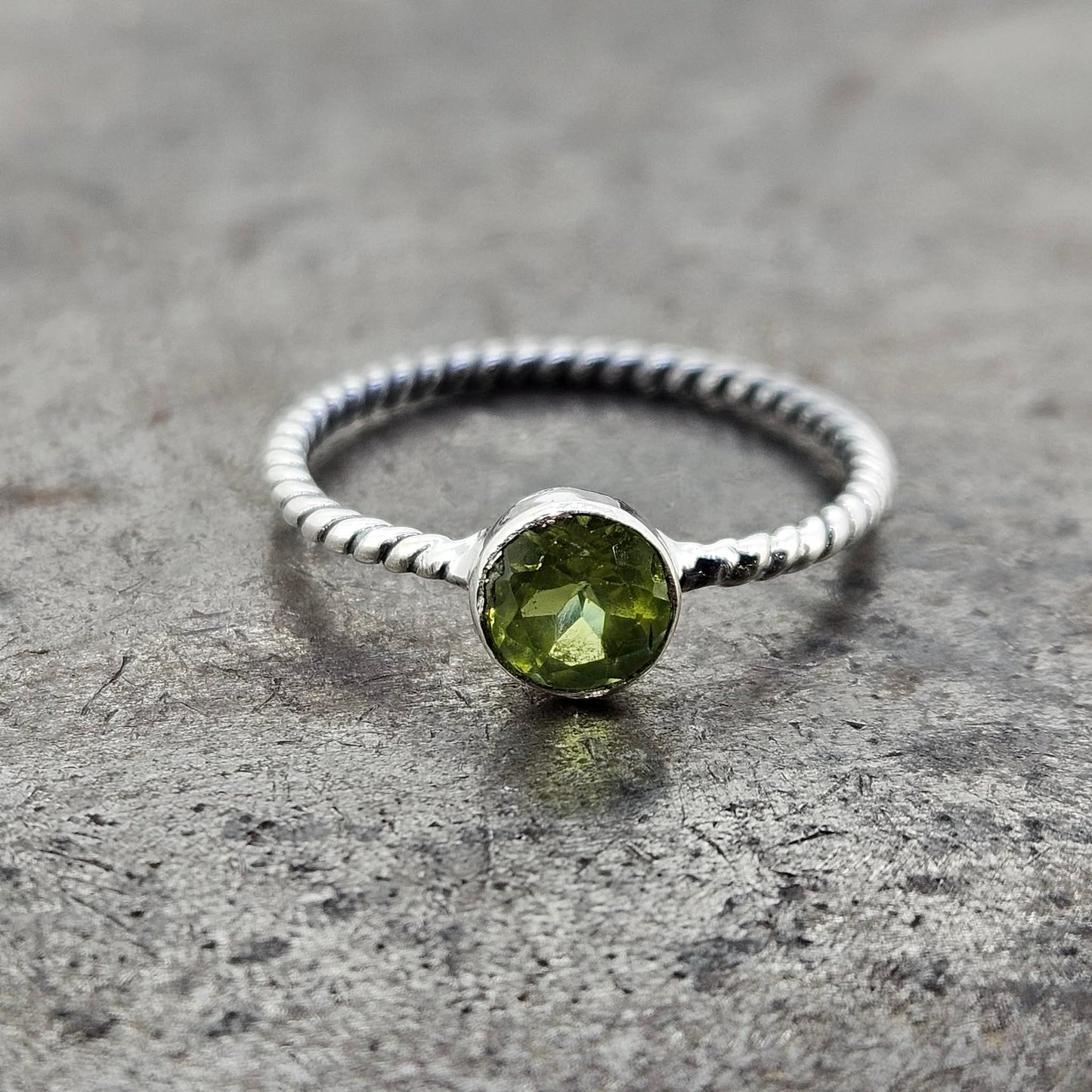 Bezel Set Gemstone Ring with Braided Band