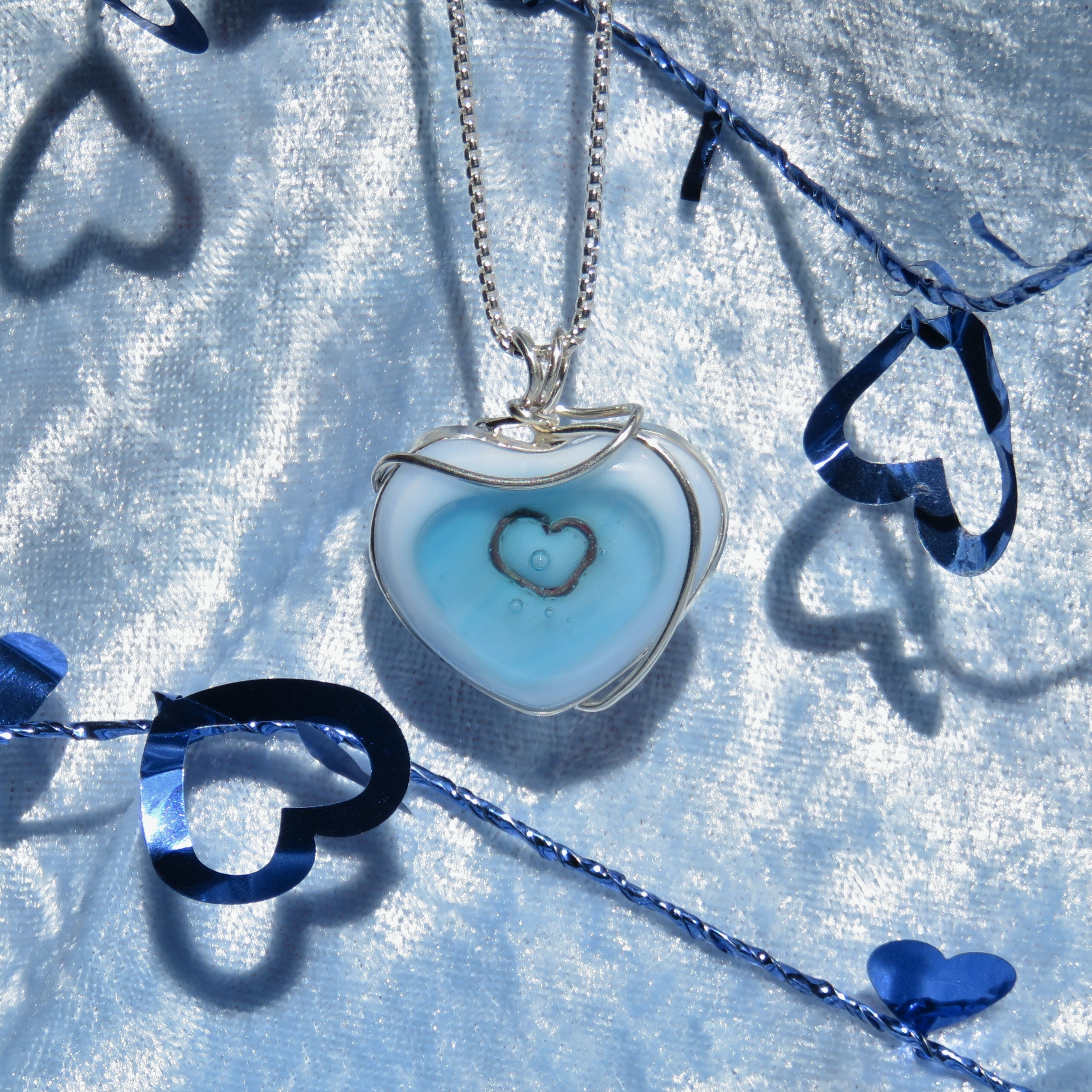 Light blue heart on sale necklace